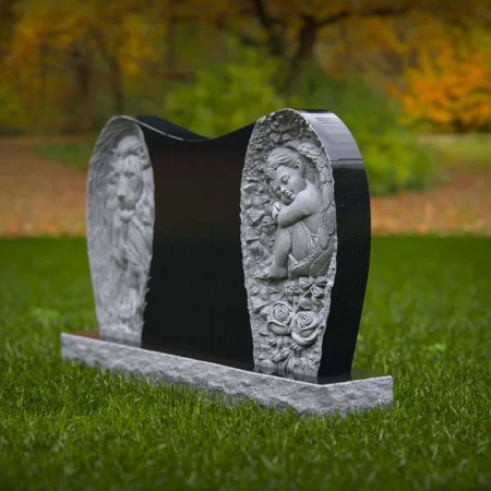 1964 - Grabstein aus Granit mit geschnitztem Löwen- und Engelmotiv