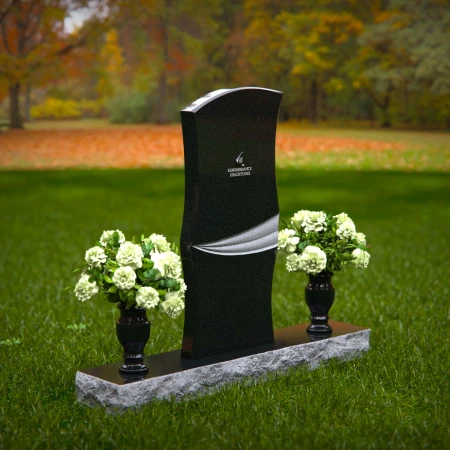 Elegant curved granite headstones with a timeless memorial design.