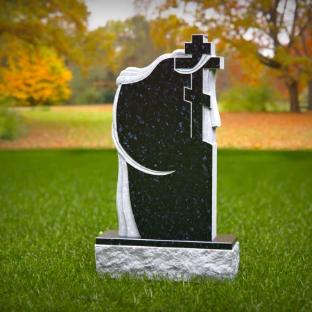 Mirrored faith elements wrapped in soft carving create heartfelt memorials