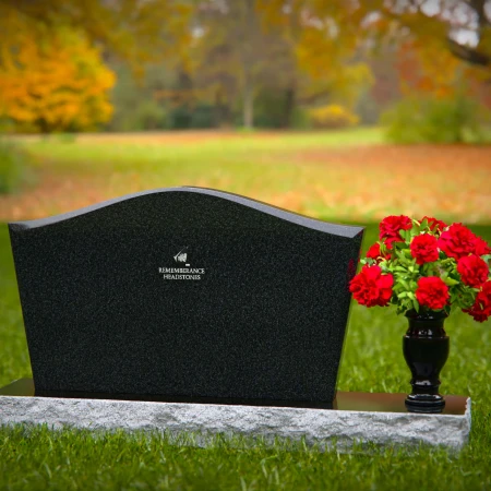 Waved granite headstones with single flower vase for graceful tribute.