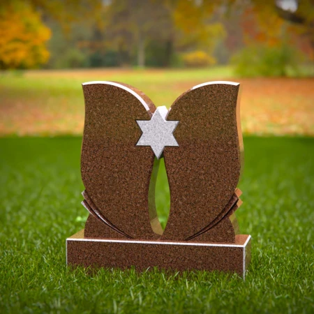 Elevated headstone designs balanced between grace and might