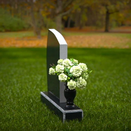 Modern angled granite headstones with vase inclusion for tribute.