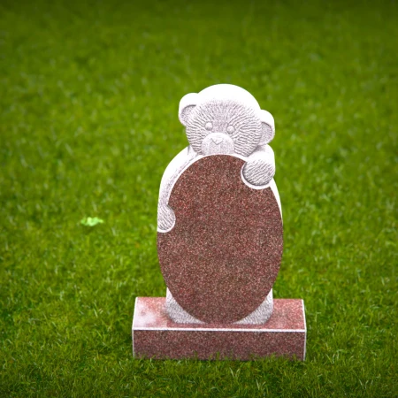 Playful memorials with sculpted bear for children’s headstones