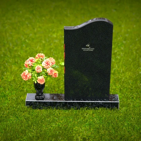 Curved granite headstones with elegant flower vase tribute.