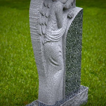 Artisan-crafted angel expresses warmth and memory in headstone near me