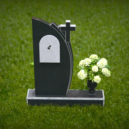 Unique headstones featuring a cross and elegant plaque design.