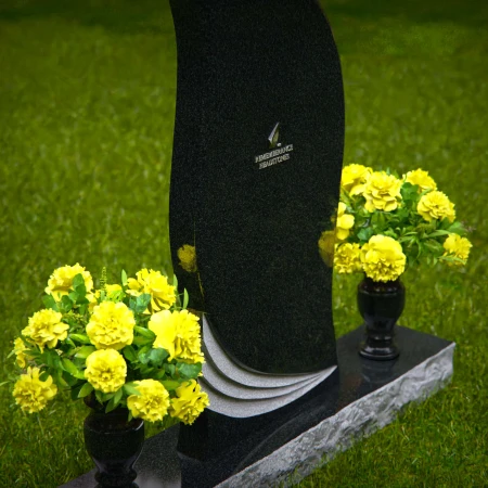 Elegant curved granite headstones with wave accents for timeless memorials.