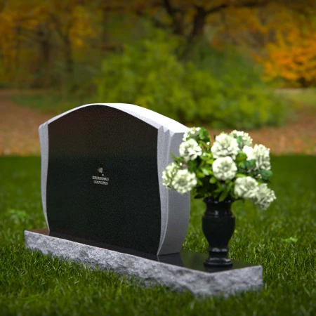 Elegant contoured headstones with flower vase for refined tribute.